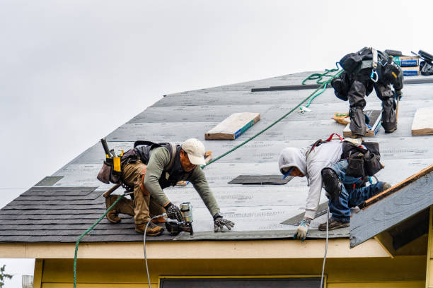 Professional Gutter Installation technician working in Swanton, VT